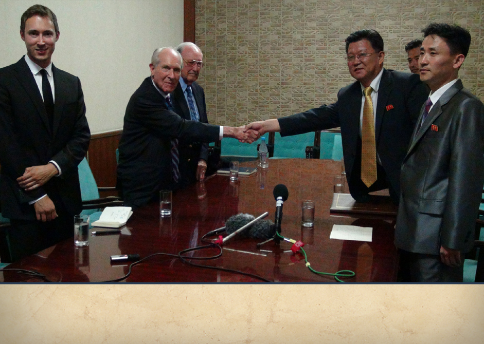 Adam Makos and Tom Hudner with North Korean army soldiers. 