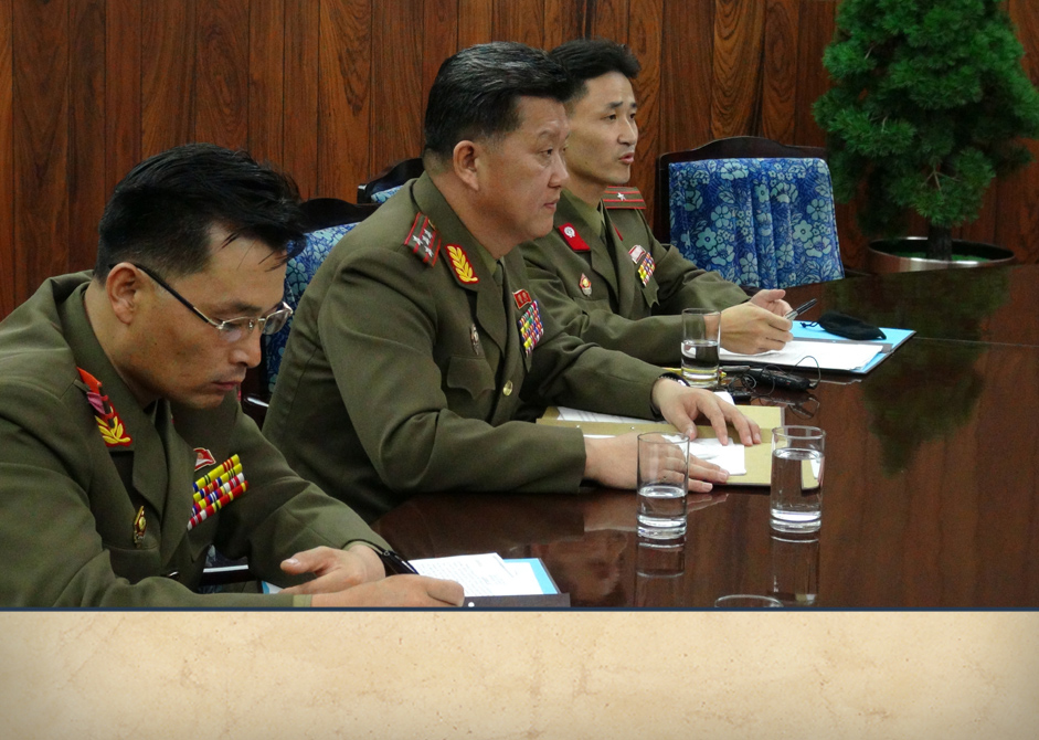 The Korean People's Army representives who met with Tom to discuss the search for Jesse's remains.